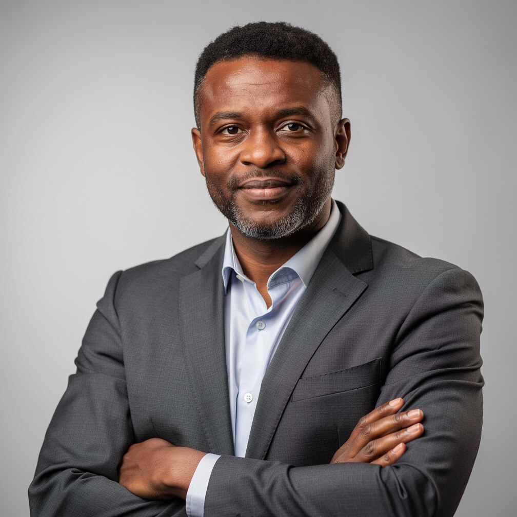 Studio portrait of a Black Belgian man in his forties in business attire